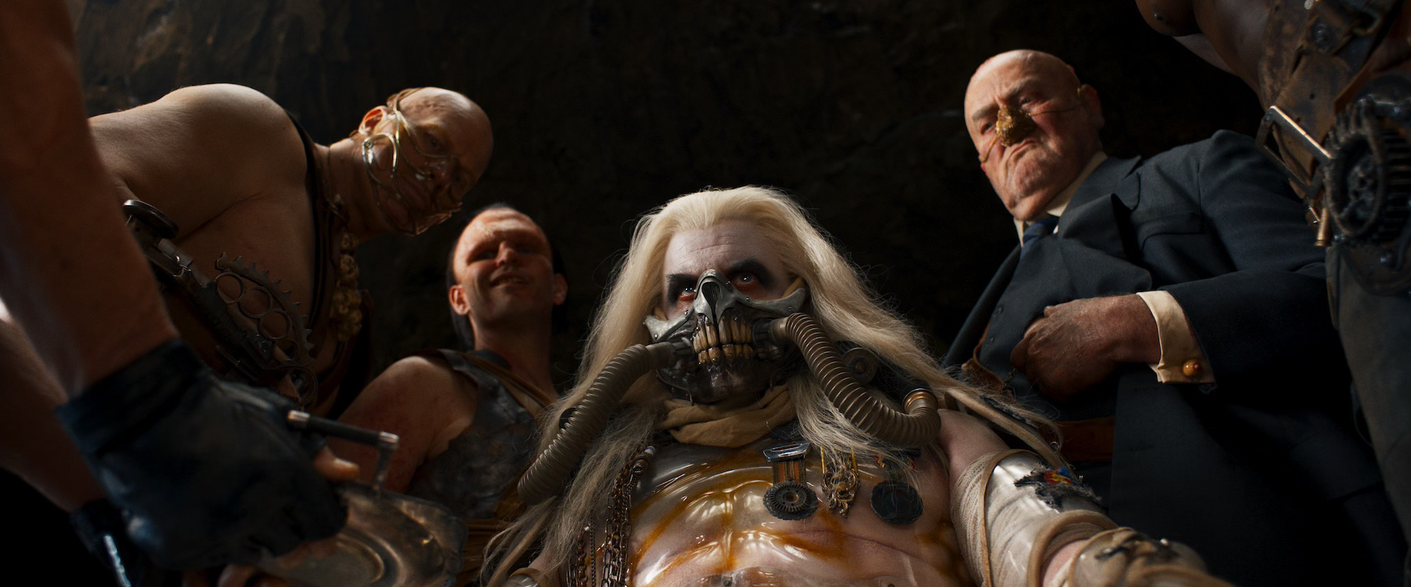 (L to R) Nathan Jones as Rictus Erectus, Josh Helman as Scrotus, Lachy Hulme as Immortan Joe, and John Howard as The People Eater in Furiosa: A Mad Max Saga