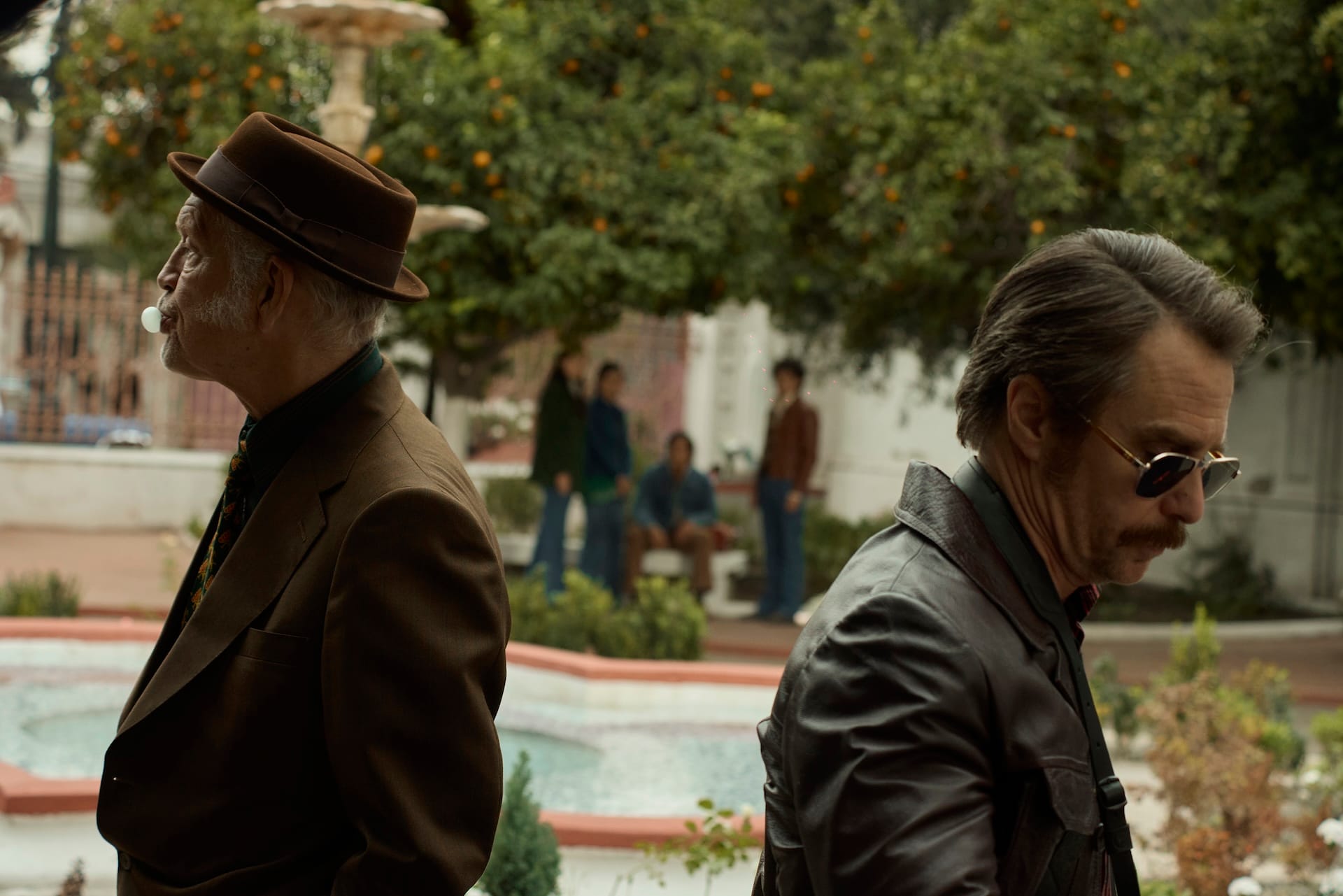 John Malkovich as Chris Carlisle and Sam Rockwell as Lee Chesterfield in Wild Horse Nine