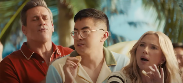 Jon Hamm, Bowen Yang, and Scarlett Johansson in a Super Bowl ad for Ritz crackers.