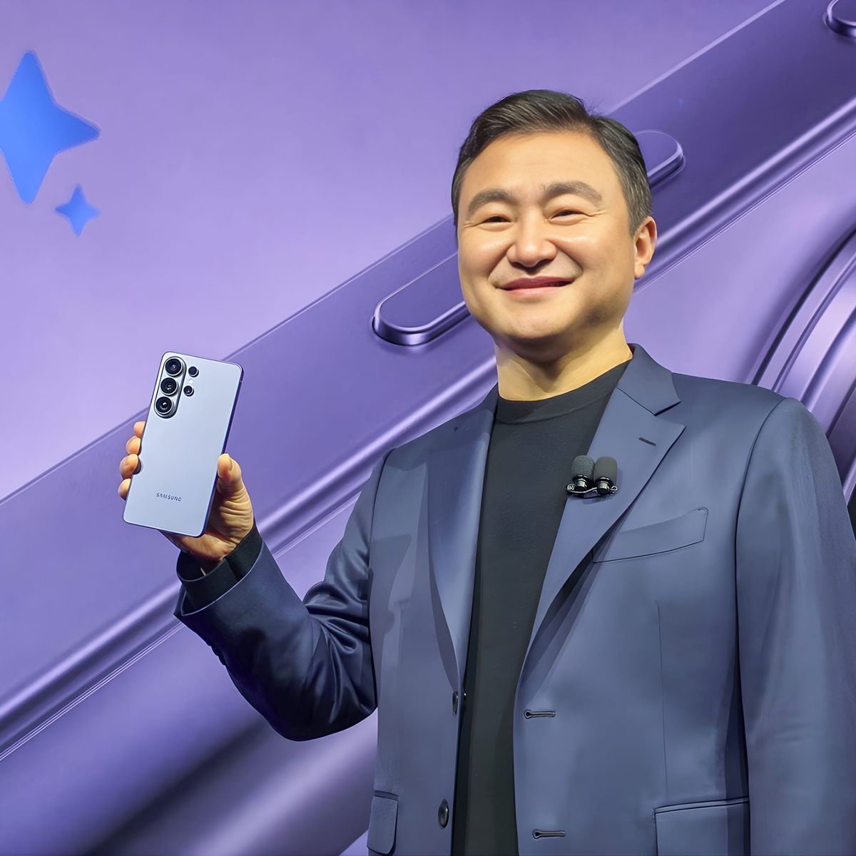 Samsung executive holding Galaxy S26 Ultra on stage at Galaxy Unpacked 2026
