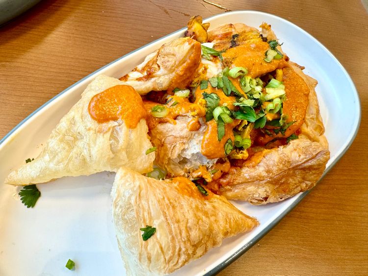 Naan-chos? At the Ismaili Center's Tapestry, they pop.