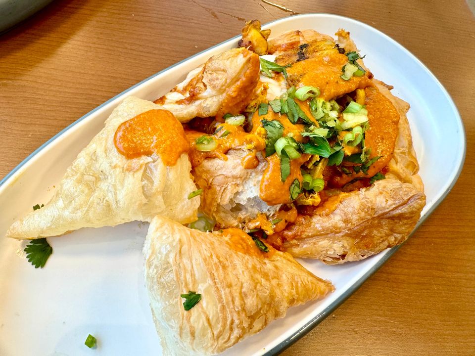 Naan-chos? At the Ismaili Center's Tapestry, they pop.