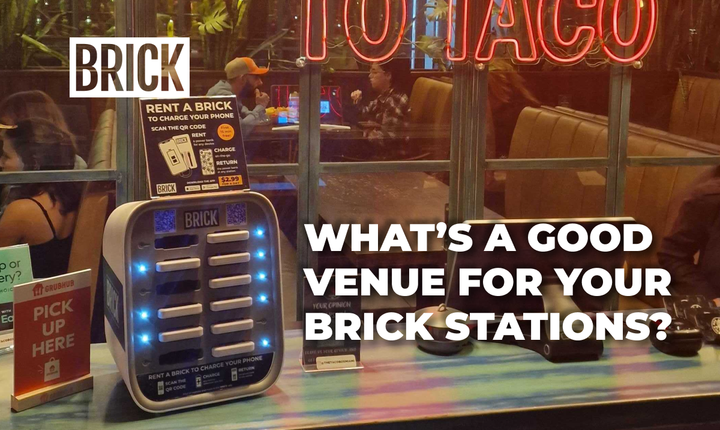 Brick 12 slot powerbank sharing station on a front desk in a taco restaurant