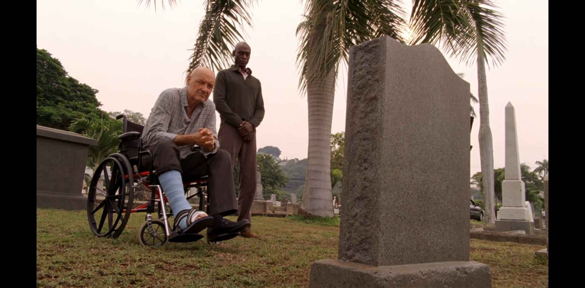 John Locke (in wheelchair) and Abaddon beside Helen's grave.