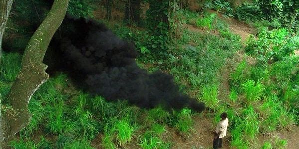 Mr Eko stares down the smoke.