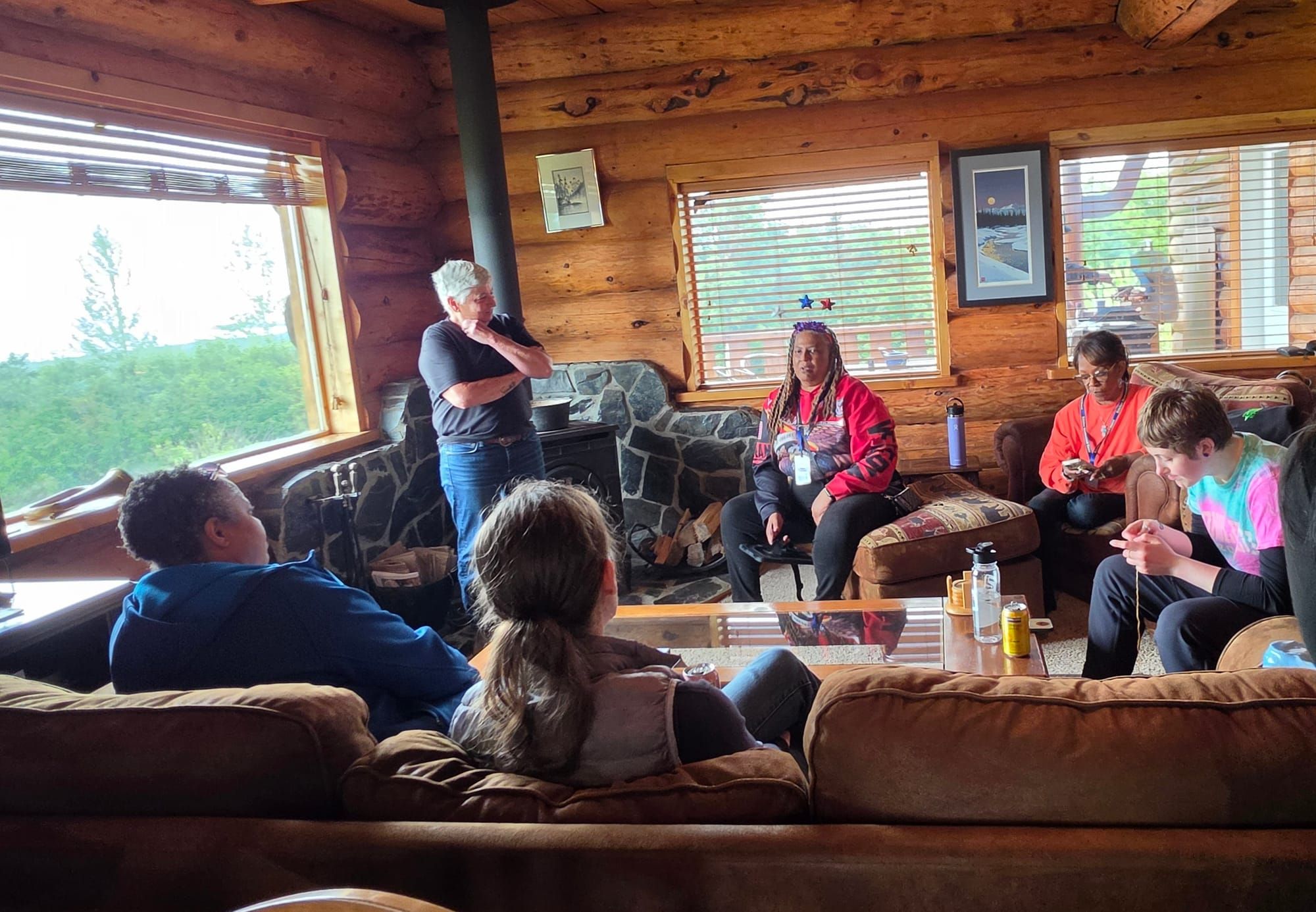 Women veterans gather for a listening circle inside the Base Camp lodge.
