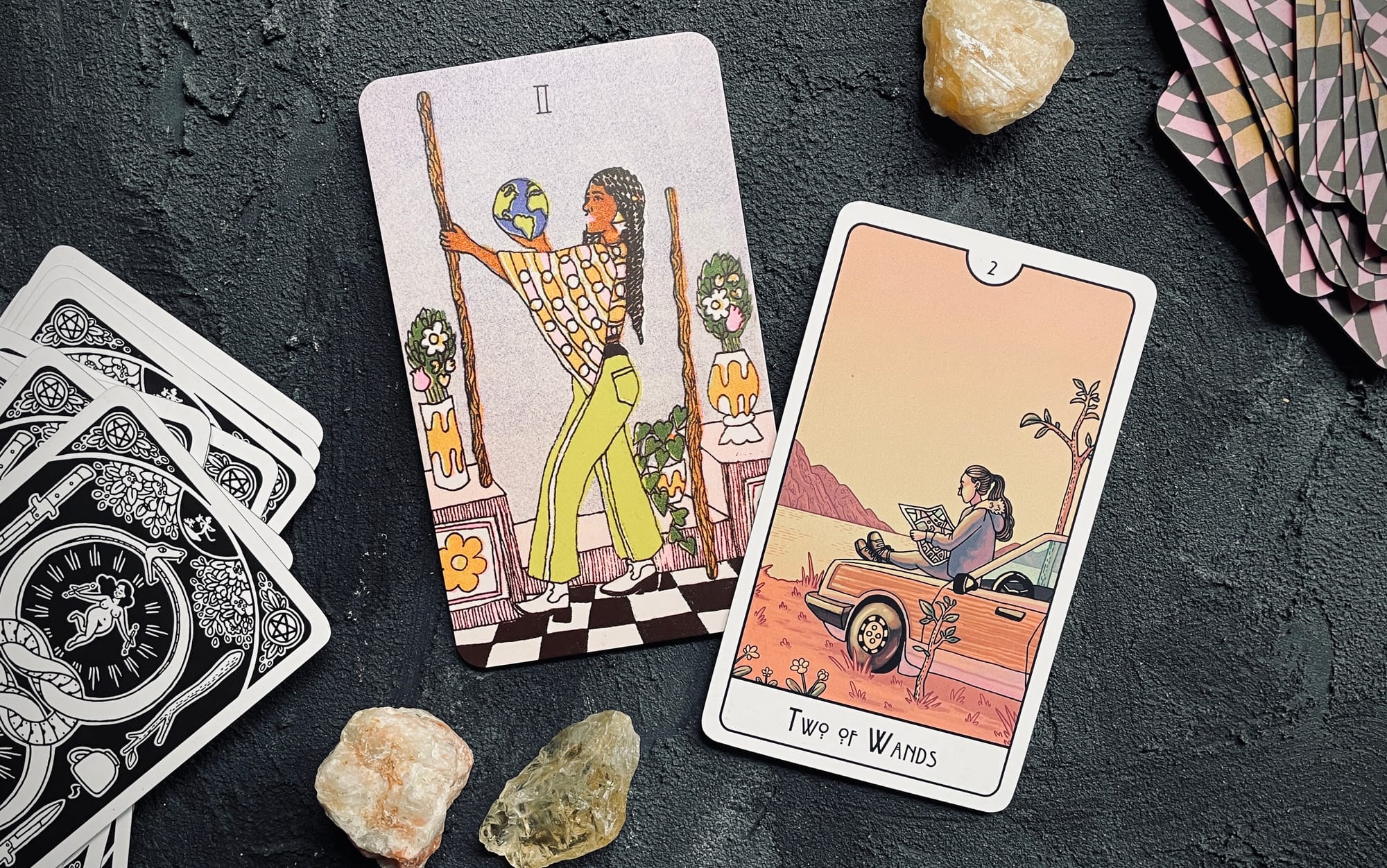 two of wands from the queer tarot and the this might hurt tarot