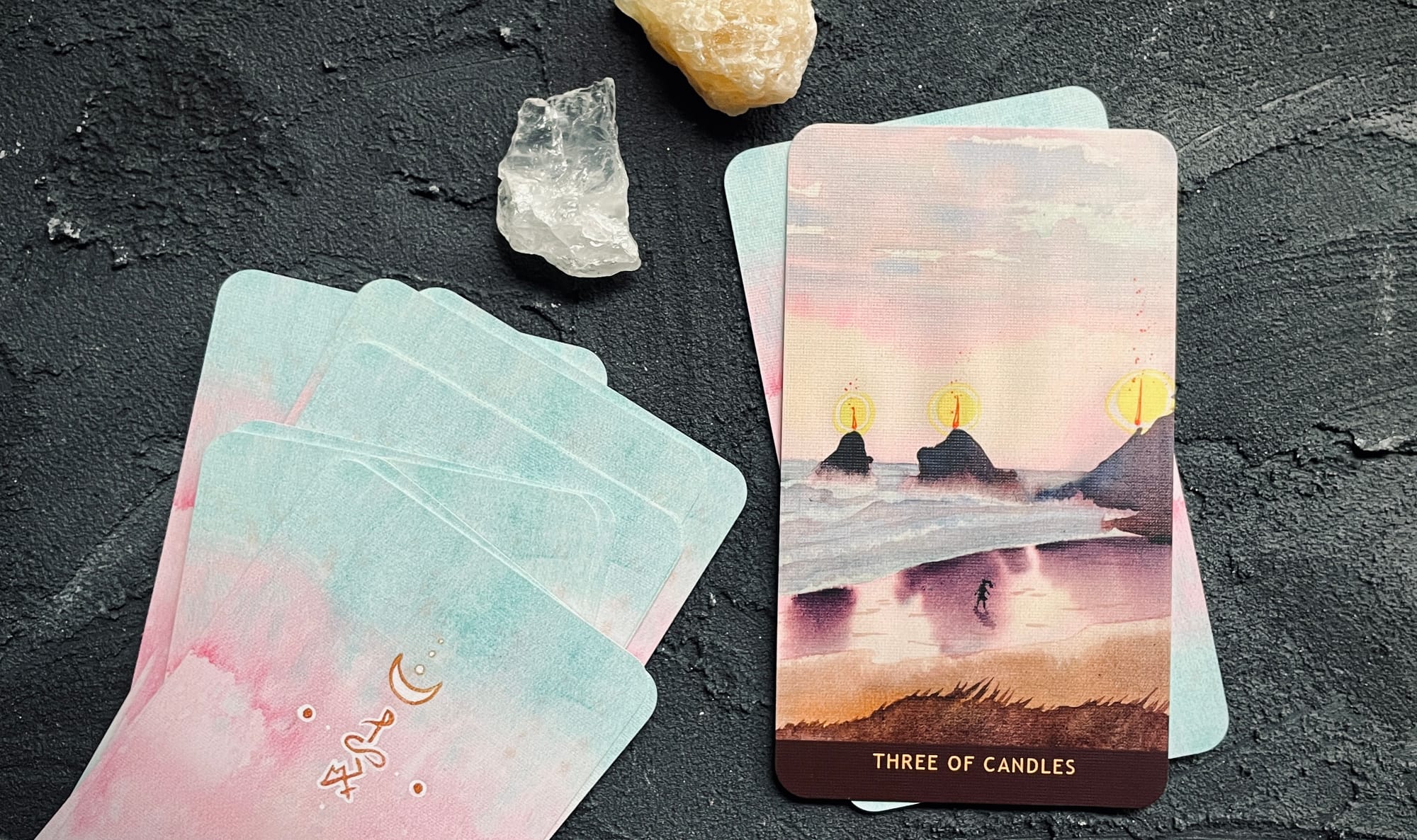 three of candles (wands) from the numinous tarot