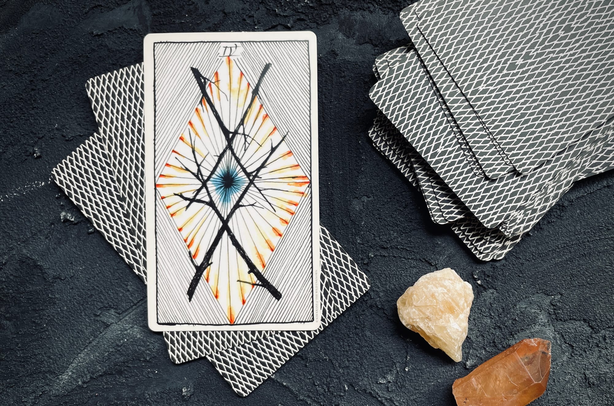 four of wands from the wild unknown tarot