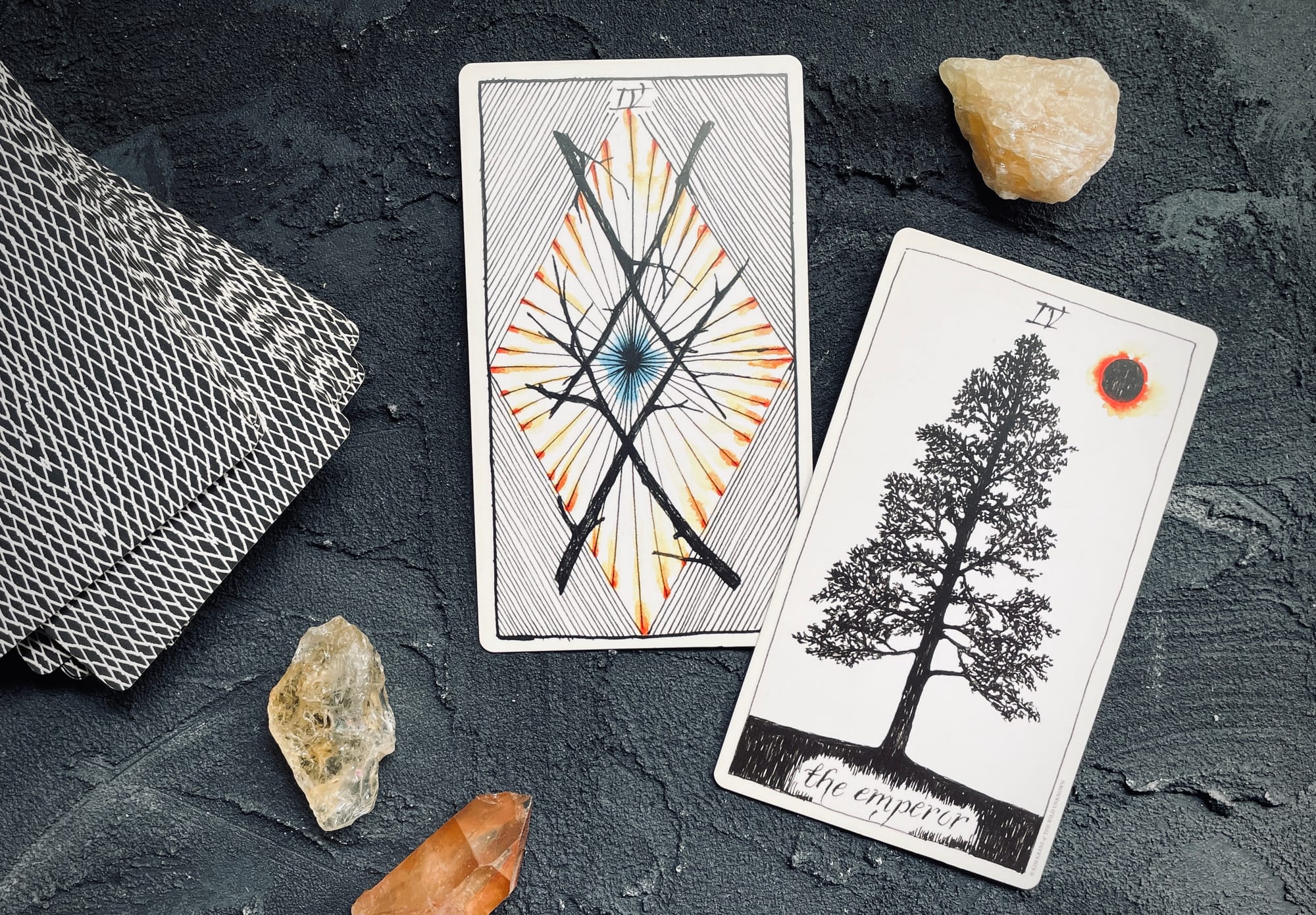 four of wands and emperor from the wild unknown tarot