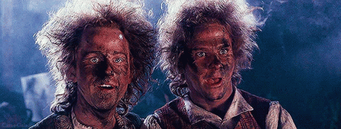 merry & pip from the lord of the rings films, smudged with ash after setting off gandolf's fireworks