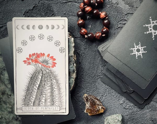 seven of pentacles from the lumina tarot