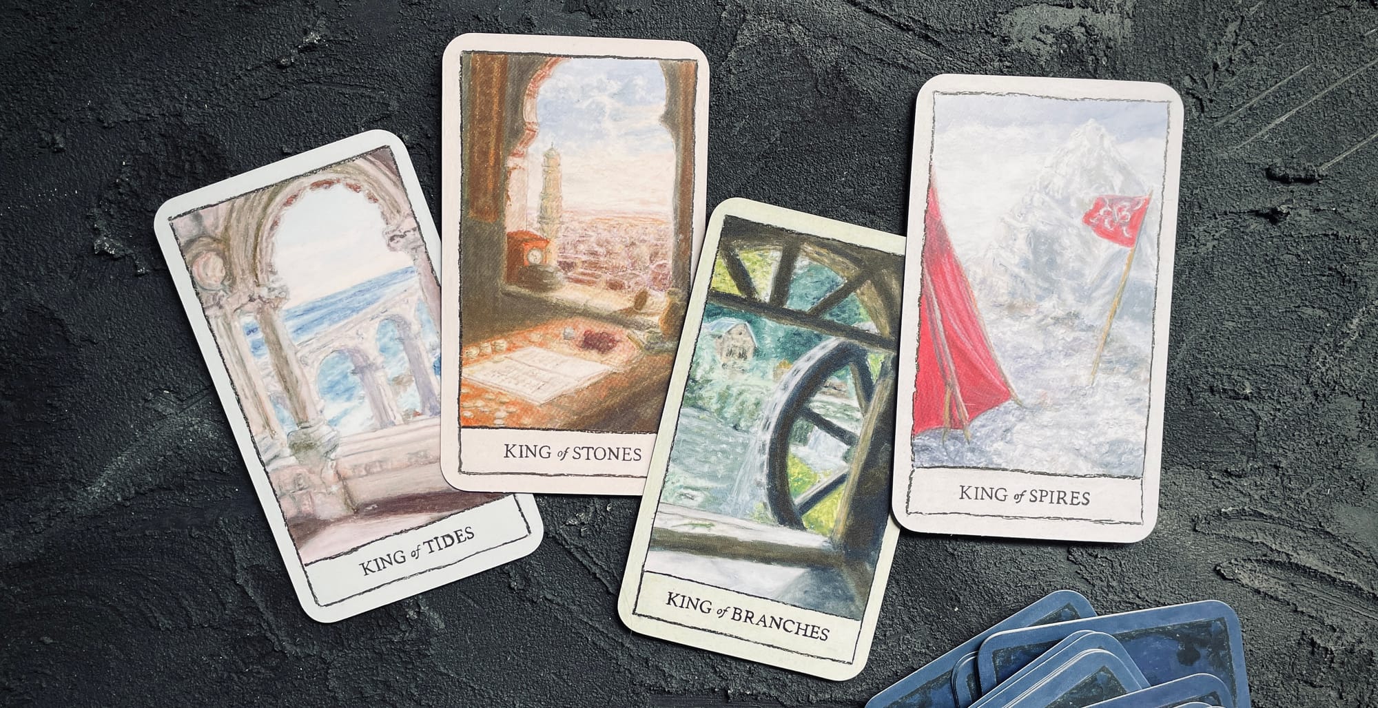 (left to right) king of tides, king of stones, king of branches, and king of spires from the mindscapes tarot