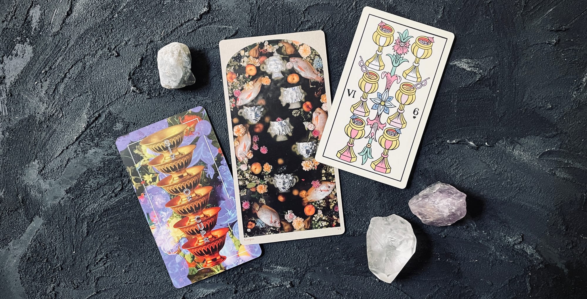 six of cups from the anthropologist tarot (left), tarot of the drowning world (center), and gay marseille (right)