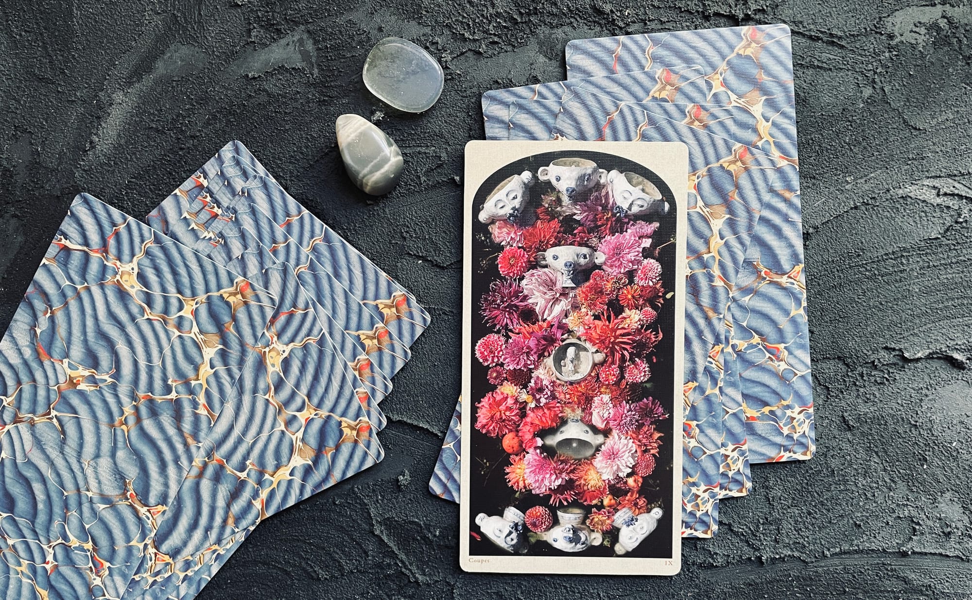 nine of cups from the tarot of the drowning world