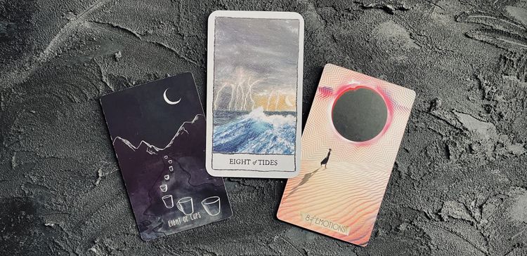 eight of cups from the spacious tarot (left), the mindscapes tarot (center), and the muse tarot (right)