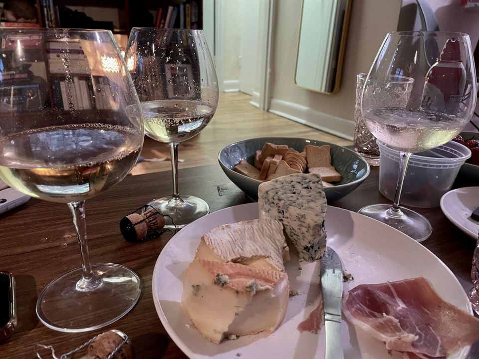 wine & cheese from a recent three of cups evening with dear friends