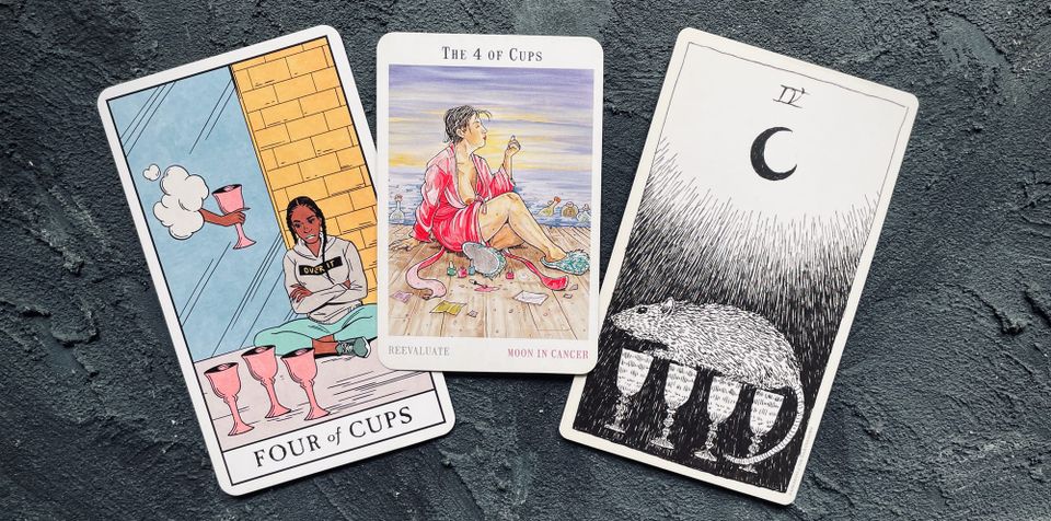 four of cups from the modern witch tarot (left), next world tarot (center), and wild unknown tarot (right)
