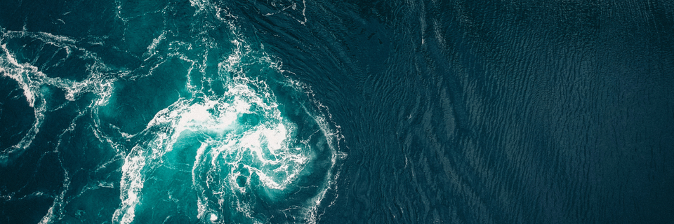 overhead shot of a current in a river