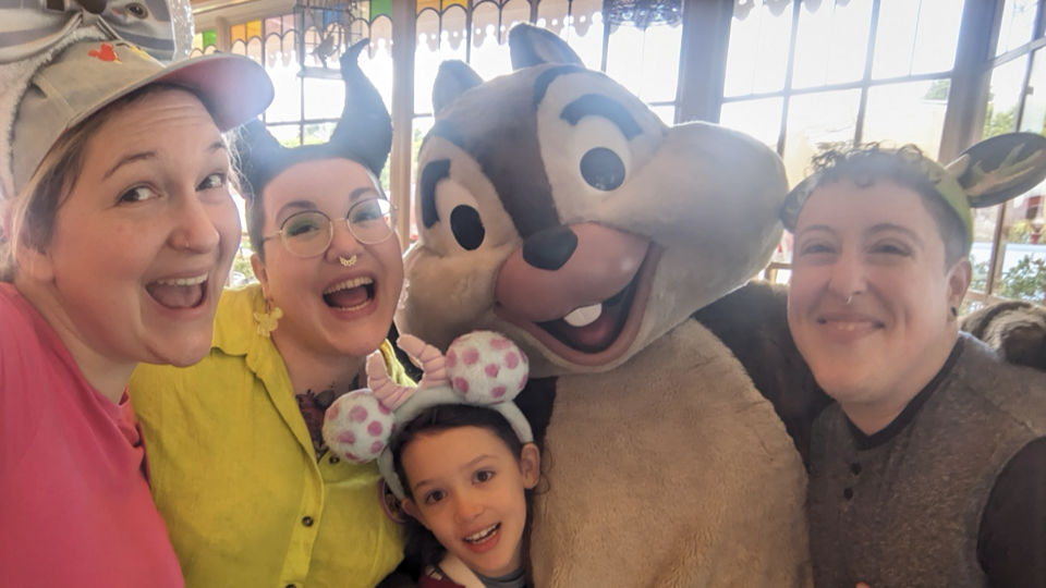 Marcelle, Hannah, Billy, and Raimi posing with Chip (of Chip and Dale)
