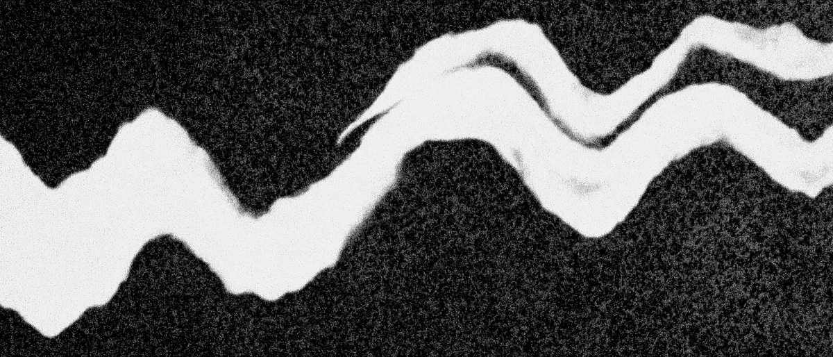 Grainy black and white photograph of a waving line of light