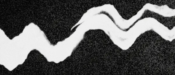 Grainy black and white photograph of a waving line of light