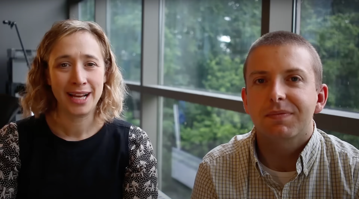 Sarah Lefton and Kyle Oliver in front of window
