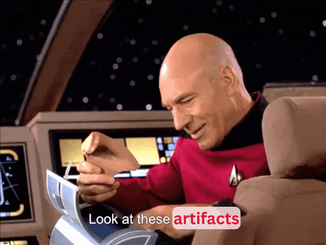 GIF of Captain Picard showing off artifacts