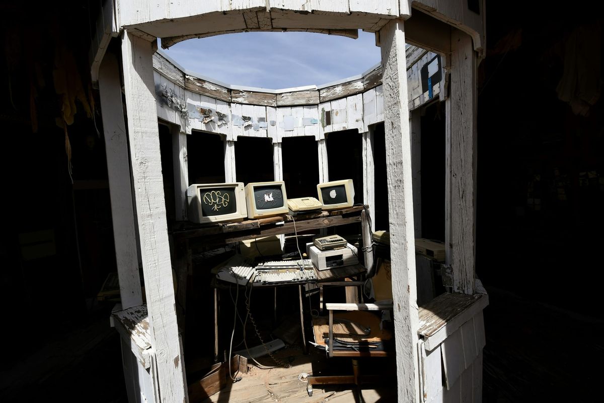 A bunch of old computers in a cupola