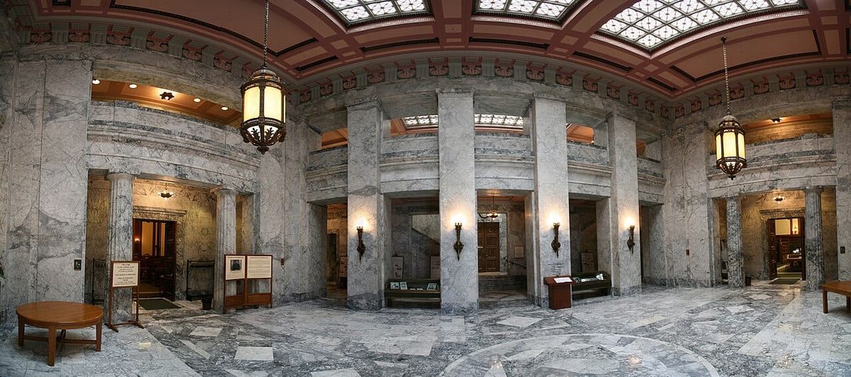 An ornate marble lobby in a government building
