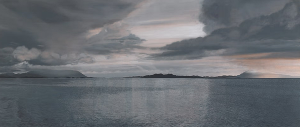 A painting of a wide expanse of seascape with distant mountains, islands and dramatic clouds.