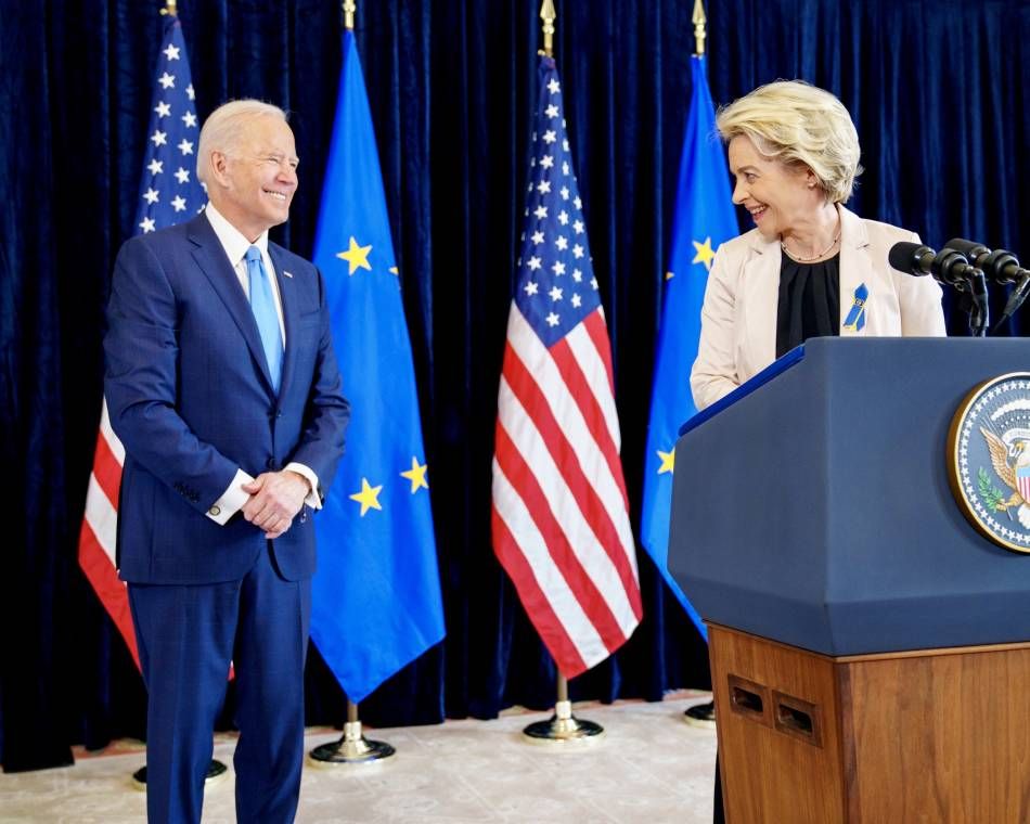 U.S. President Joe Biden watches as European Commission President Ursula von der Leyen speaks