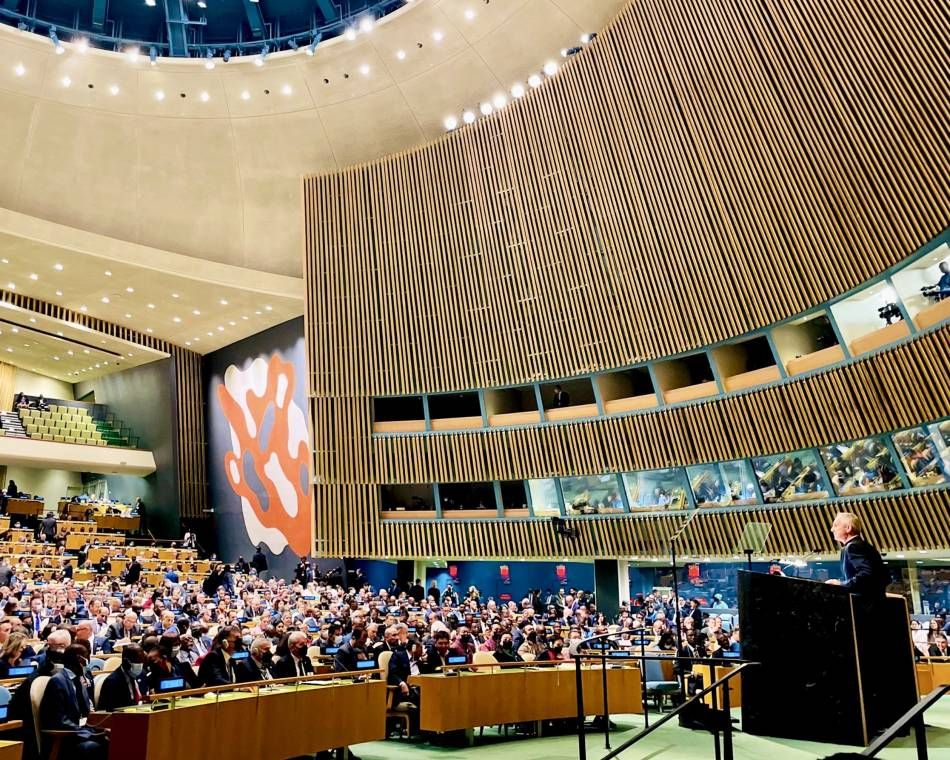 A woman points to flooded areas of Bangladesh's Gaibandha district in August 2020