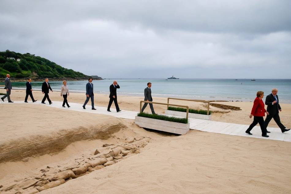 G-7 leaders at the U.K.-hosted summit along Carbis Bay in Cornwall, England