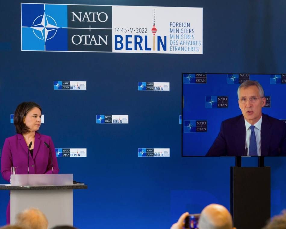 German Foreign Minister Annalena Baerbock and NATO Secretary General Jens Stoltenberg appear at a joint news conference