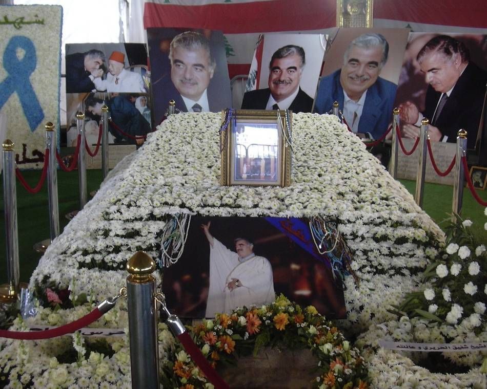 Flowers and photos are laid by Rafik Hariri's tomb in downtown Beirut in 2008