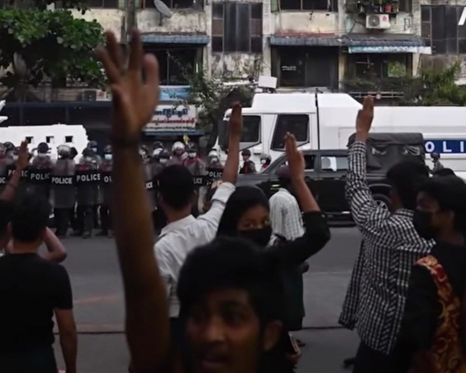 Protesters in Myanmar raise a three-fingered salute in solidarity and resistance against the military coup
