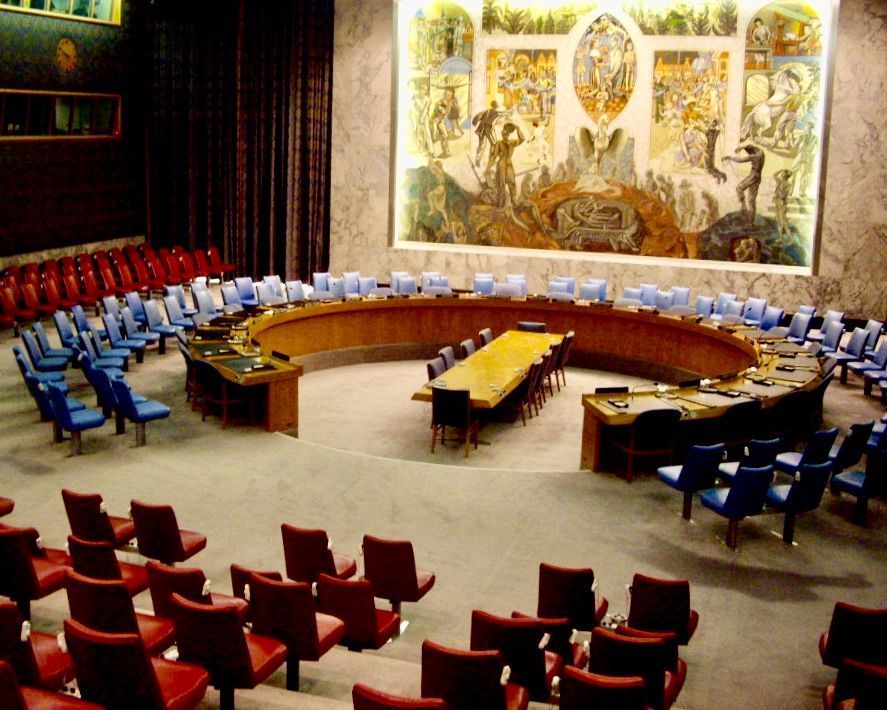 The U.N. Security Council chamber featuring a mural with the image of a phoenix rising in wartime