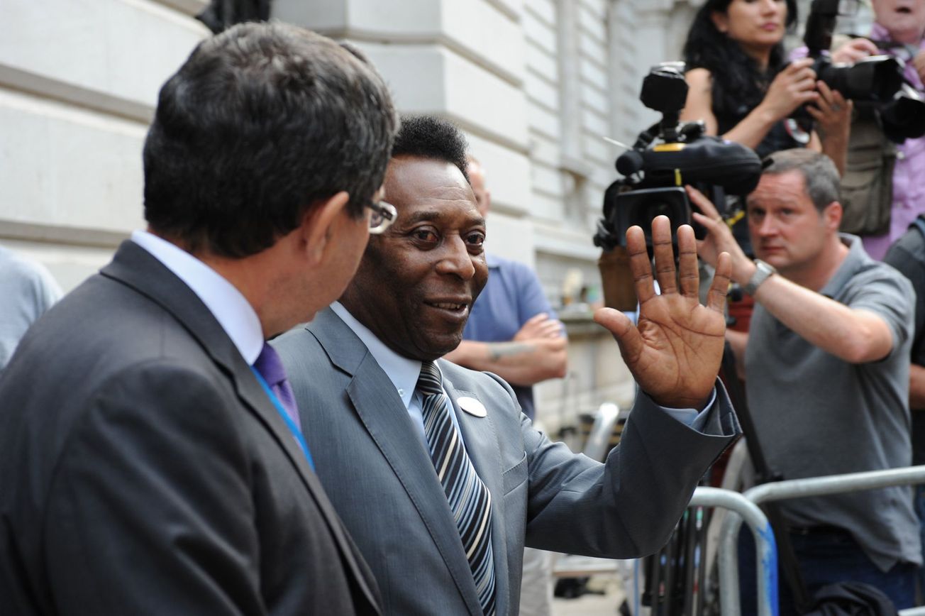 Football legend Pelé arriving for the 2012 Olympic hunger summit in London.