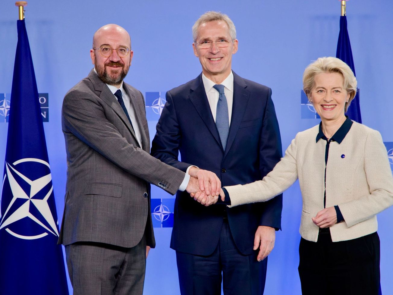 NATO Secretary-General Jens Stoltenberg, center, poses with E.U. leaders