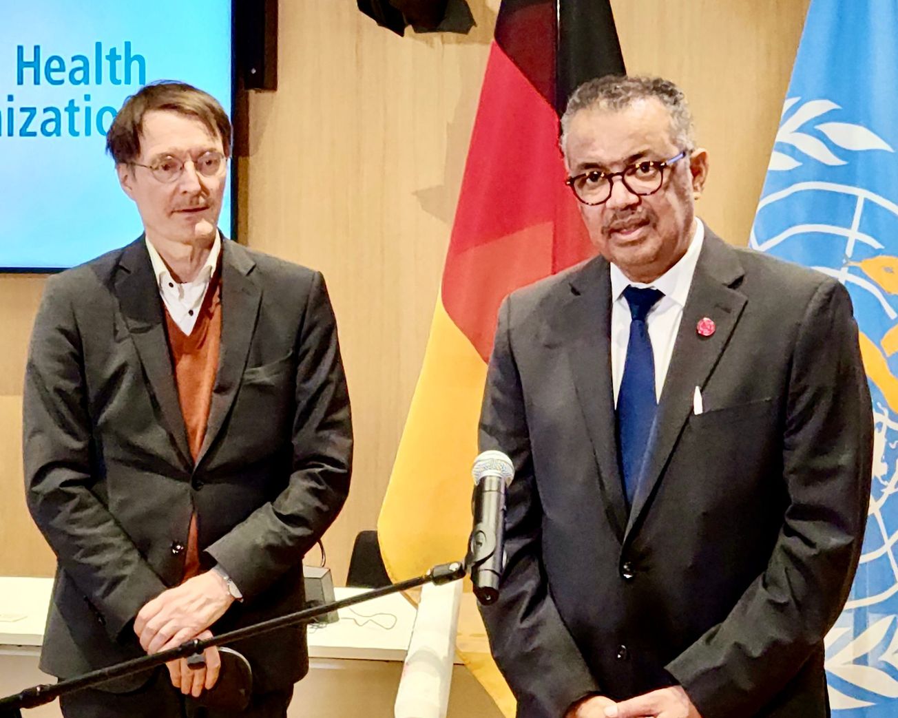 German Health Minister Karl Lauterbach, left, and WHO Director-General Dr Tedros Adhanom Ghebreyesus speak to reporters