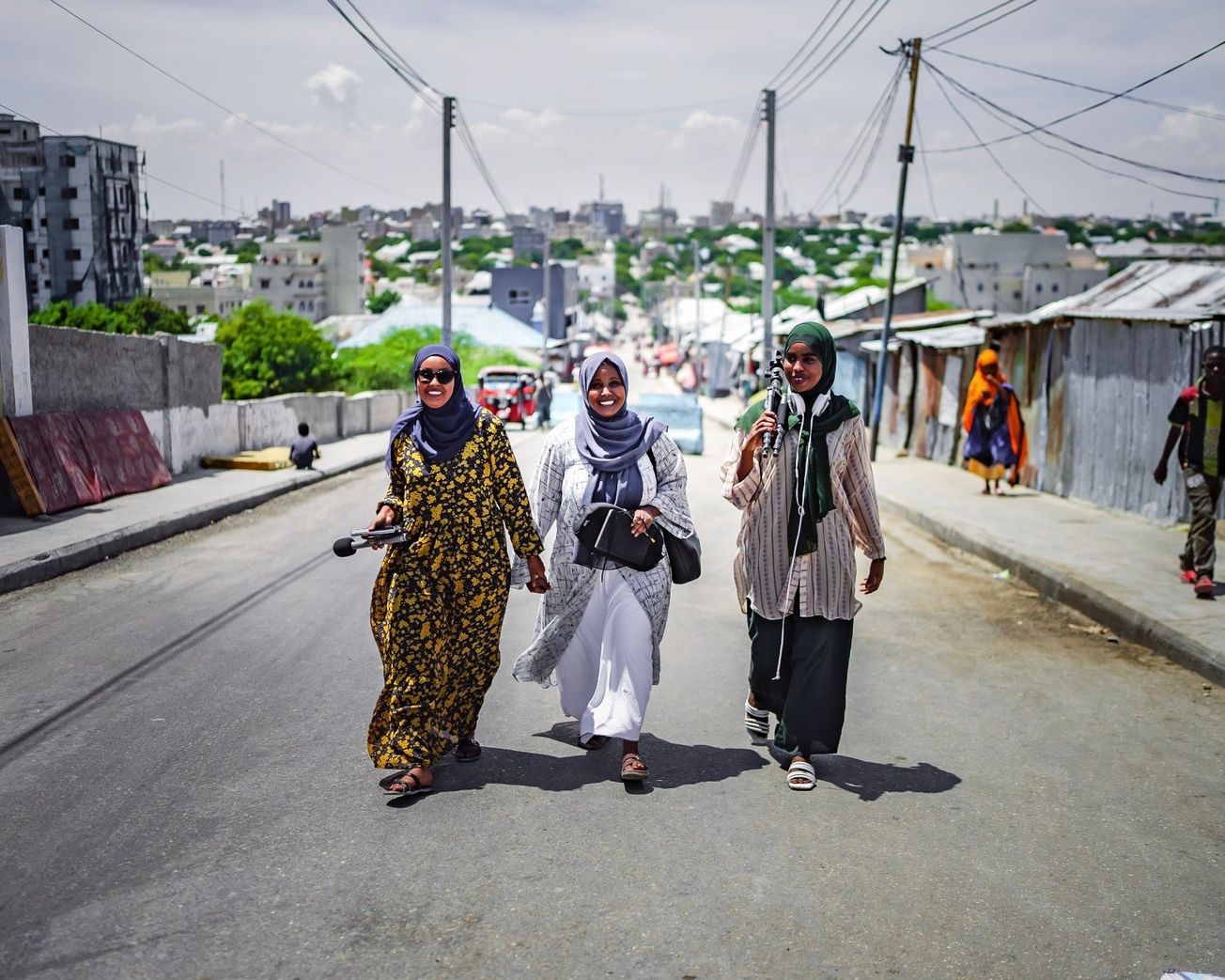 Three members of Somalia’s groundbreaking all-women media team Bilan.