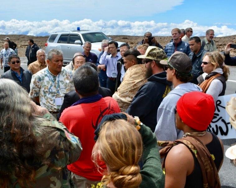 Activists protest the 2014 groundbreaking for the Thirty Meter Telescope