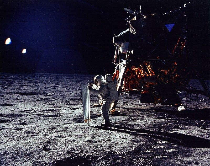 U.S. astronaut Buzz Aldrin erects the Swiss-designed solar wind composition experiment during the first moon landing.