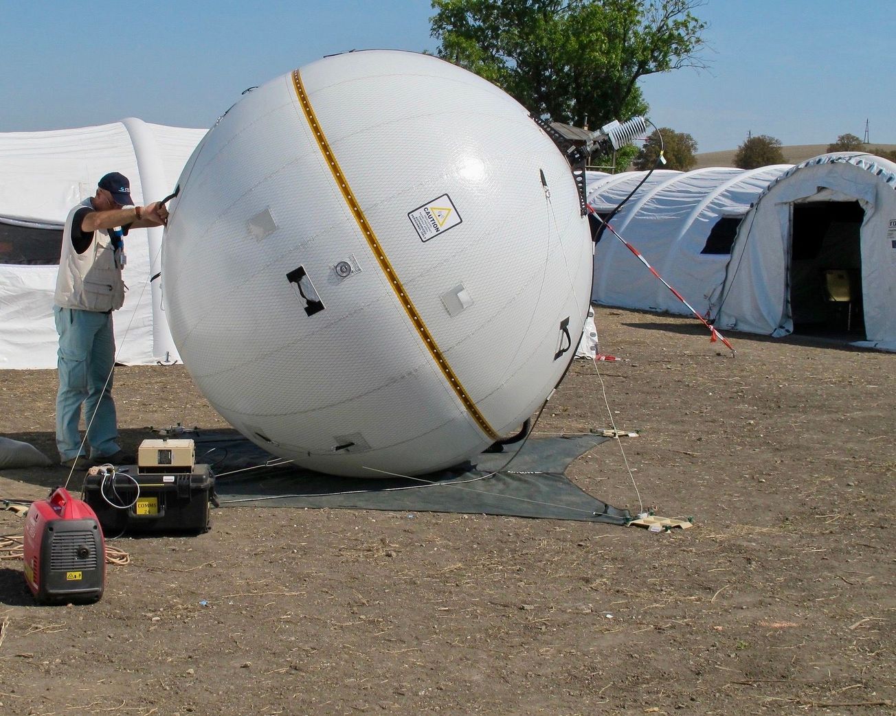 An inflatable satellite antenna for on-site nuclear weapons inspections.