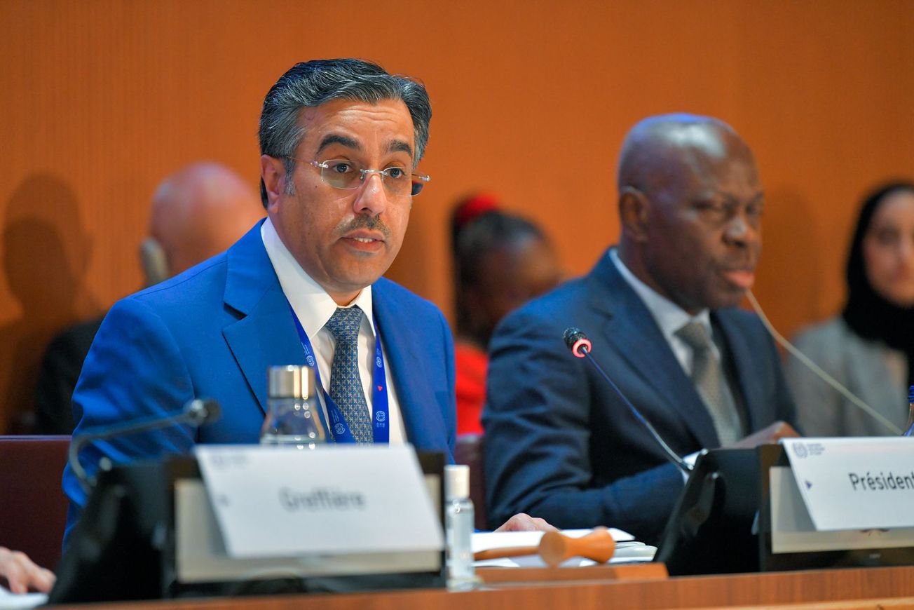 Qatar's Labor Minister Ali bin Samikh al-Marri, left, and ILO Director General Gilbert Houngbo.