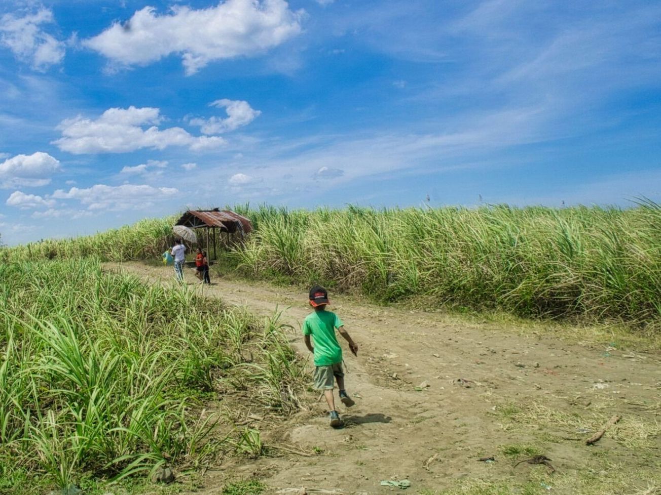 Children heading home from school in the Philippines