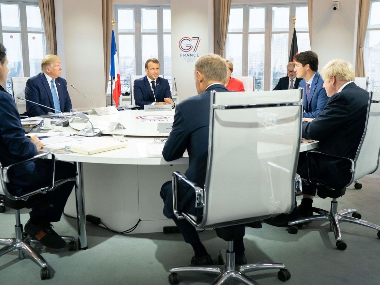 French President Emmanuel Macron, center, hosts G-7 leaders on August 25, 2019, in Biarritz, France