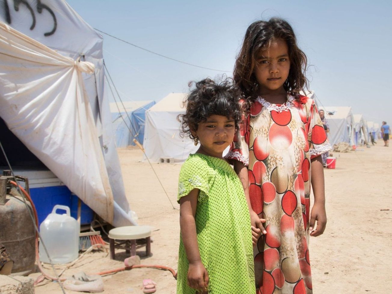Two young girls at a refugee camp in Iraq