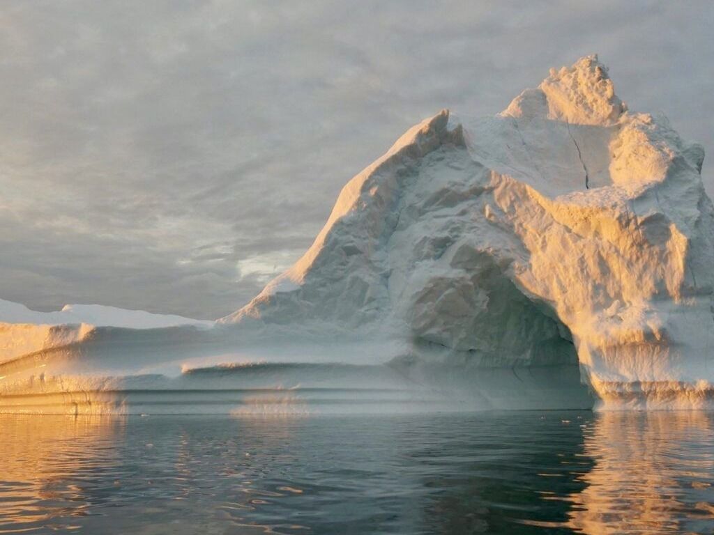 An iceberg floats in Disko Bay near Ilulissat, Greenland